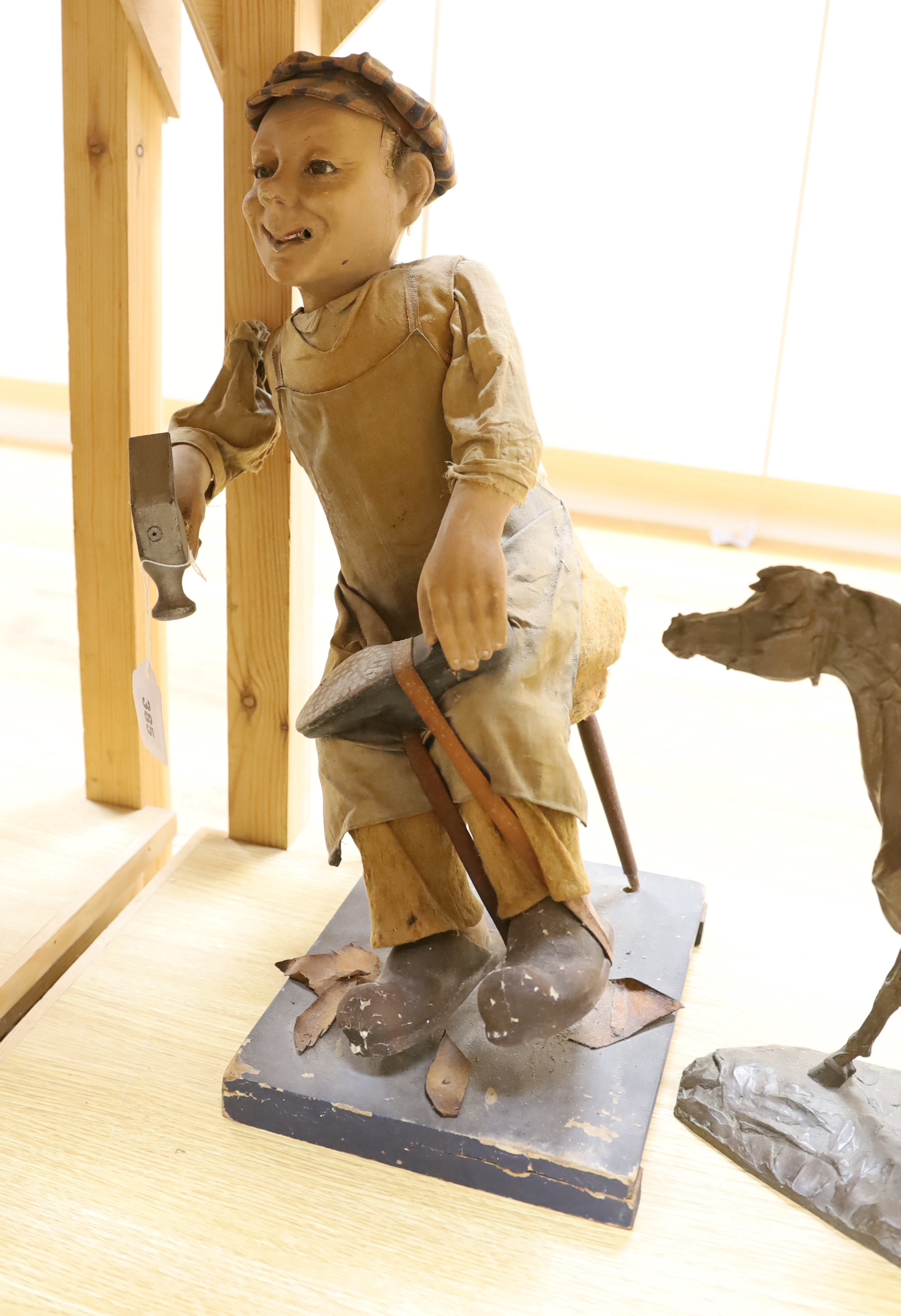 A Cobbler model, toy fort, resin horse etc.